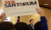 Santorum says Obama agenda not 